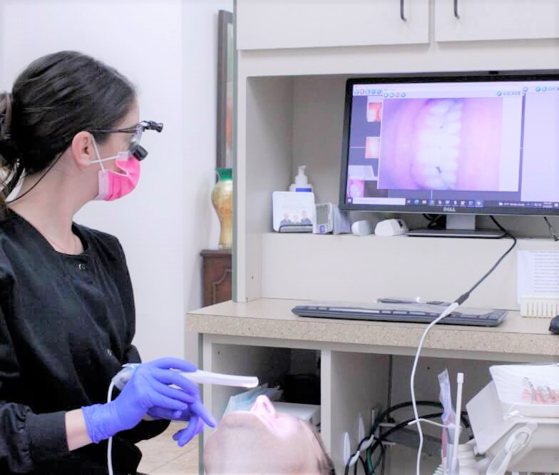 Dentist providing advanced dental services using modern dentistry technology